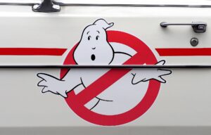 Ghost Busters logo on a car with a rad circle and link around ghost.