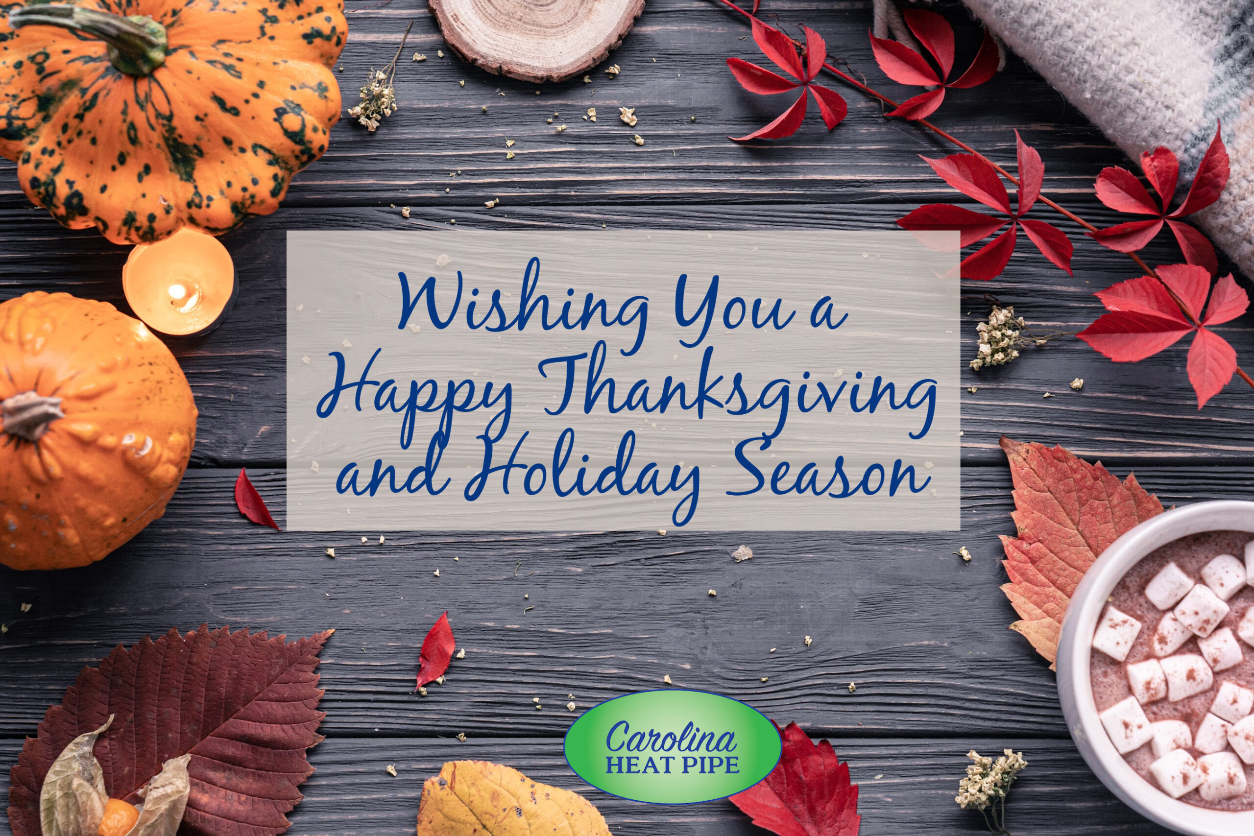 Wishing You a Happy Thanksgiving and Holiday Season with a holiday setting of pumpkins and leaves and logo for Carolina Heat Pipe